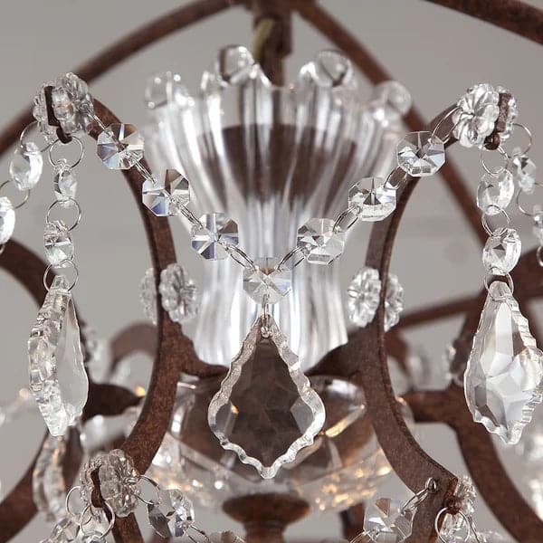 Lustre moderne en orbe en métal rouillé et cristal clair à 6 lumières