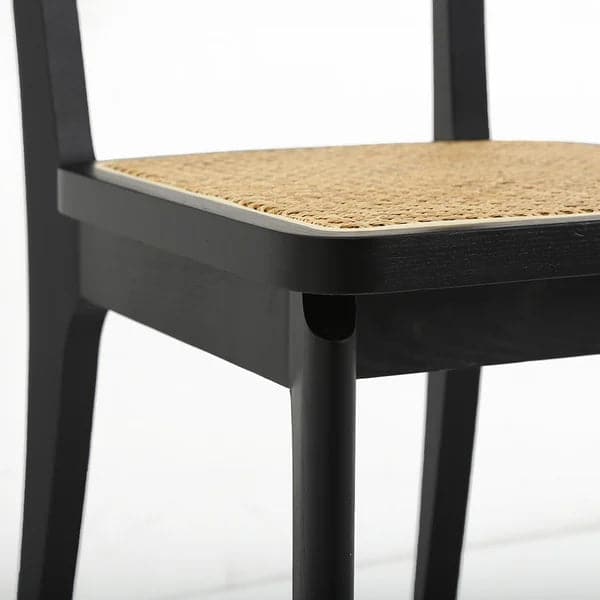 Chaise de salle à manger noire moderne en rotin et frêne