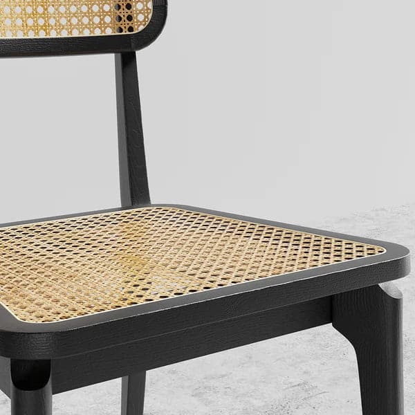 Chaise de salle à manger noire moderne en rotin et frêne