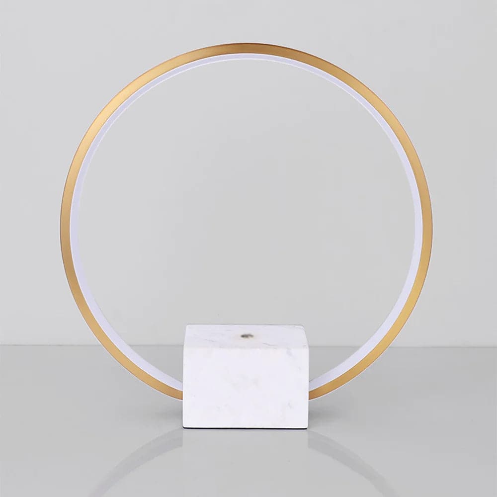 Lampe de table circulaire LED moderne en or avec base en marbre blanc