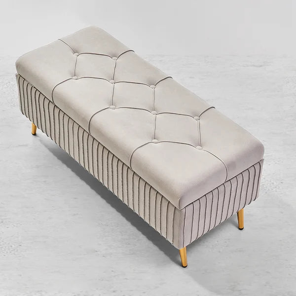 Banc de rangement moderne en velours gris avec pieds dorés