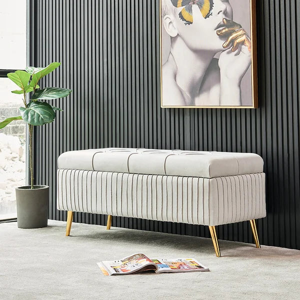 Banc de rangement moderne en velours gris avec pieds dorés