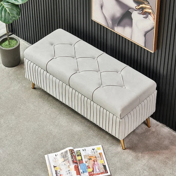 Banc de rangement moderne en velours gris avec pieds dorés