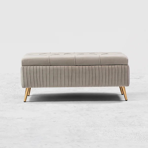 Banc de rangement moderne en velours gris avec pieds dorés