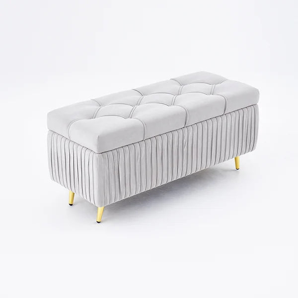 Banc de rangement moderne en velours gris avec pieds dorés