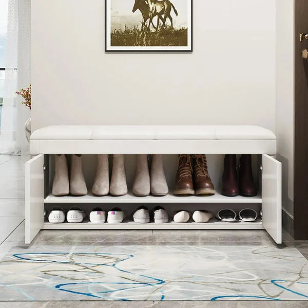 Banc d'entrée blanc avec rangement pour chaussures recouvert de cuir