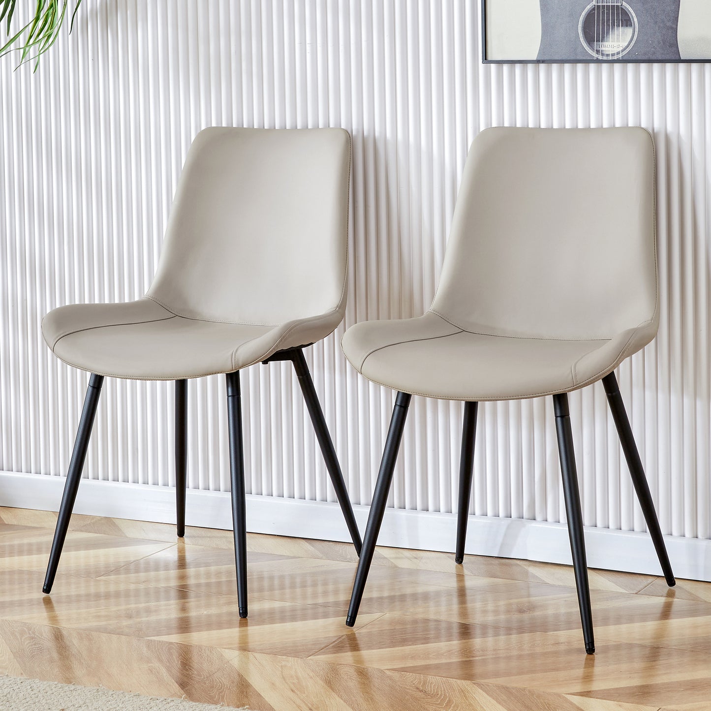 Light Gray Artificial Leather Dining Chairs with Black Metal Legs and Curved Cushions for Enhanced Comfort  - Set of 4