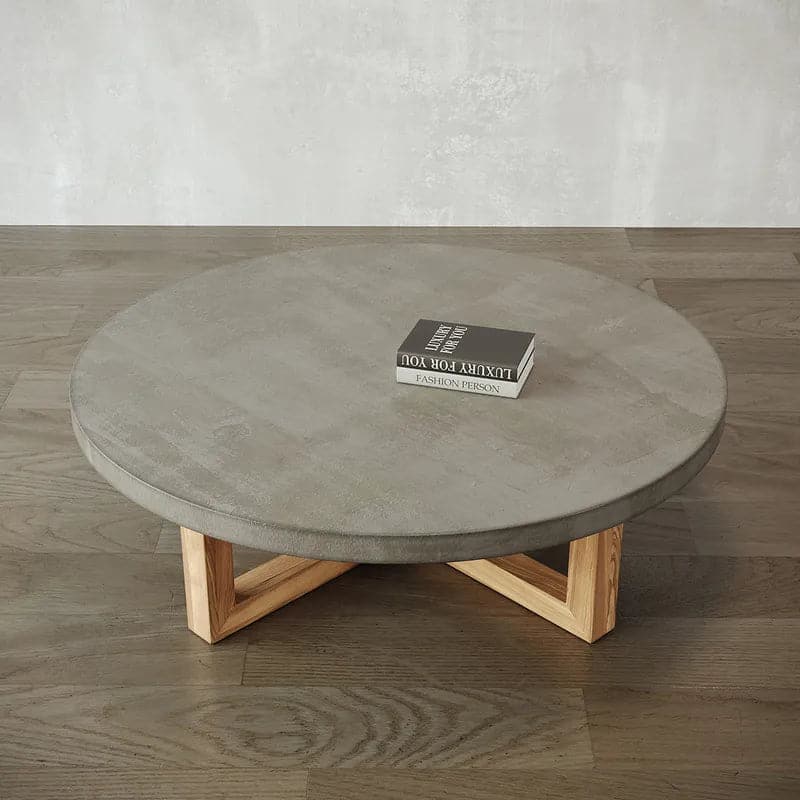 Table basse ronde en béton gris de 31 po avec pieds croisés et base en bois de pin