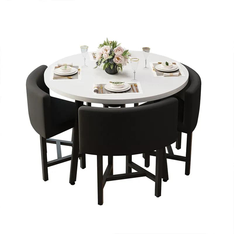 Round dining table with store nesting chairs