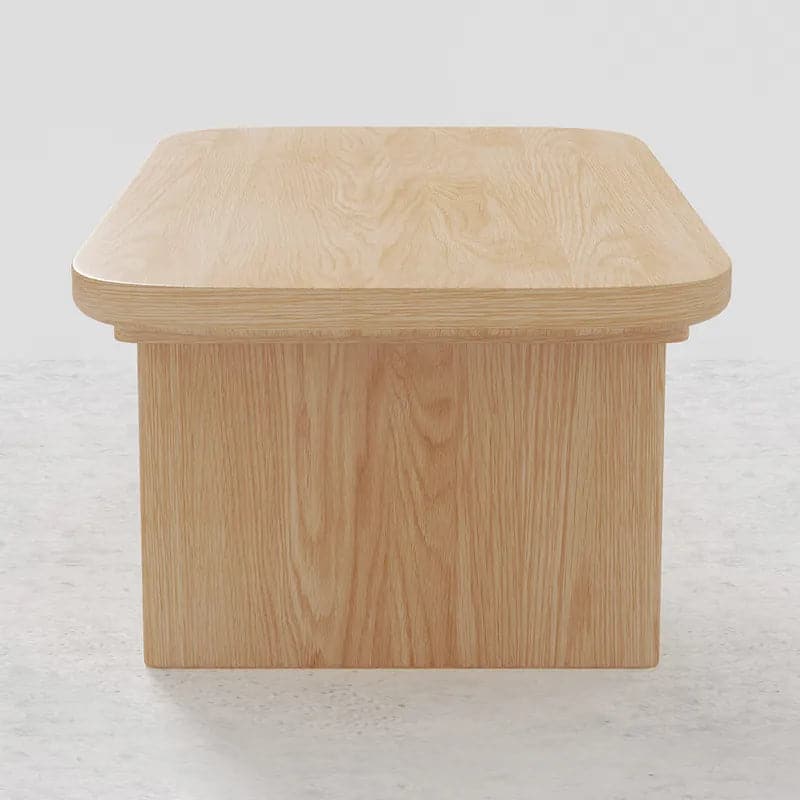 Table basse en bois de pin de 47,2 po de forme rectangulaire en naturel avec base abstraite