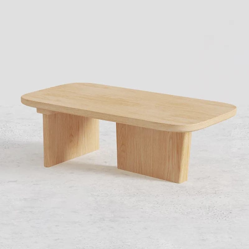 Table basse en bois de pin de 47,2 po de forme rectangulaire en naturel avec base abstraite