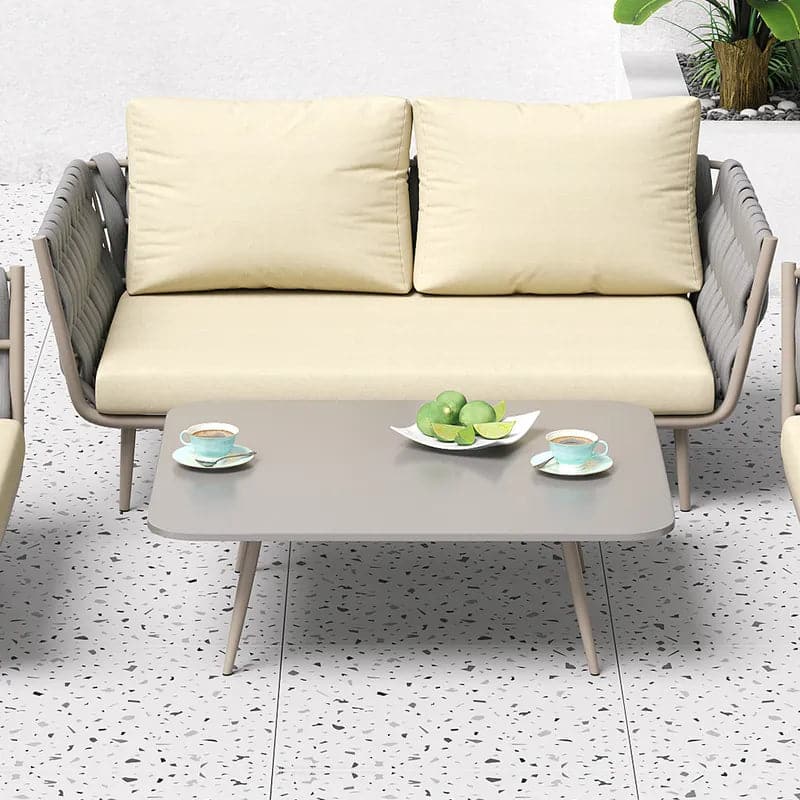Ensemble de canapés sectionnels d'extérieur 4 pièces avec sièges en sangle et coussins en beige et gris
